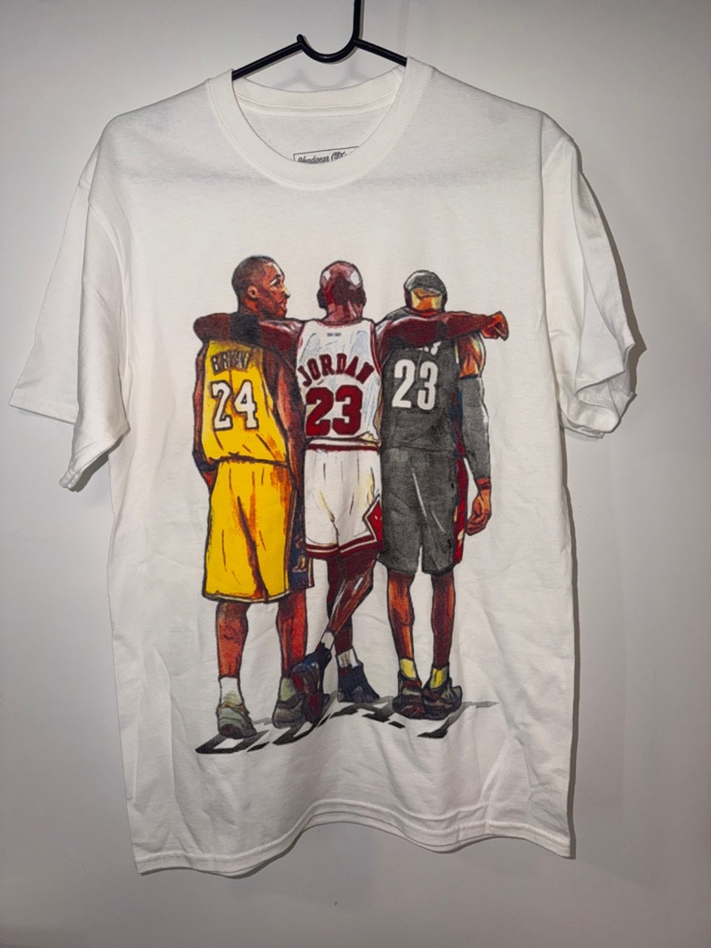 🏀🐐🏀 White Short Sleeve Tee with Basketball GOAT Graphic- Size M